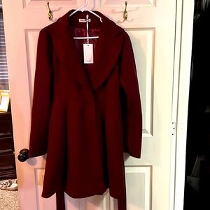Woman’s burgundy dress jacket